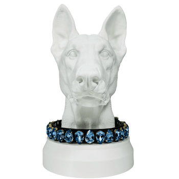 Custom crystal dog collar in blue on white dog bust, showcasing luxury pet accessories from HT Animal Supply.