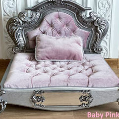 Luxury baby pink orthopedic dog bed by Decorian Design, featuring elegant tufted cushion and ornate silver frame, perfect for stylish pet comfort.