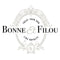 Elegant logo of Bonne et Filou featuring ornate crest, "Treat Your Dog Like Royalty" motto, symbolizing luxury pet treats.