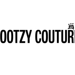 Logo of Bootzy Couture featuring stylish text and crown motif, symbolizing luxury pet accessories and trendy pet fashion for 2025.