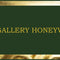 Elegant Gallery Honeywinter logo in gold on green, symbolizing luxury pet supplies and bespoke furniture.