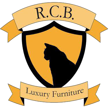 Logo of Royal Cat Boutique featuring a black cat silhouette on a golden shield, with banners reading 'R.C.B.' and 'Luxury Furniture'