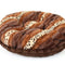 Plush leopard print bagel bed from HT Animal Supply, ideal for cozy pet sleep, blending luxury pet accessories with home décor.