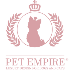 Logo of Pet Empire featuring a regal cat silhouette within an ornate circle, flanked by laurel wreaths, representing premium pet products.