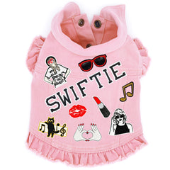 Pink Swiftie-inspired denim dog harness vest with playful patches, ruffled hem, perfect for trendy pet fashion 2025.