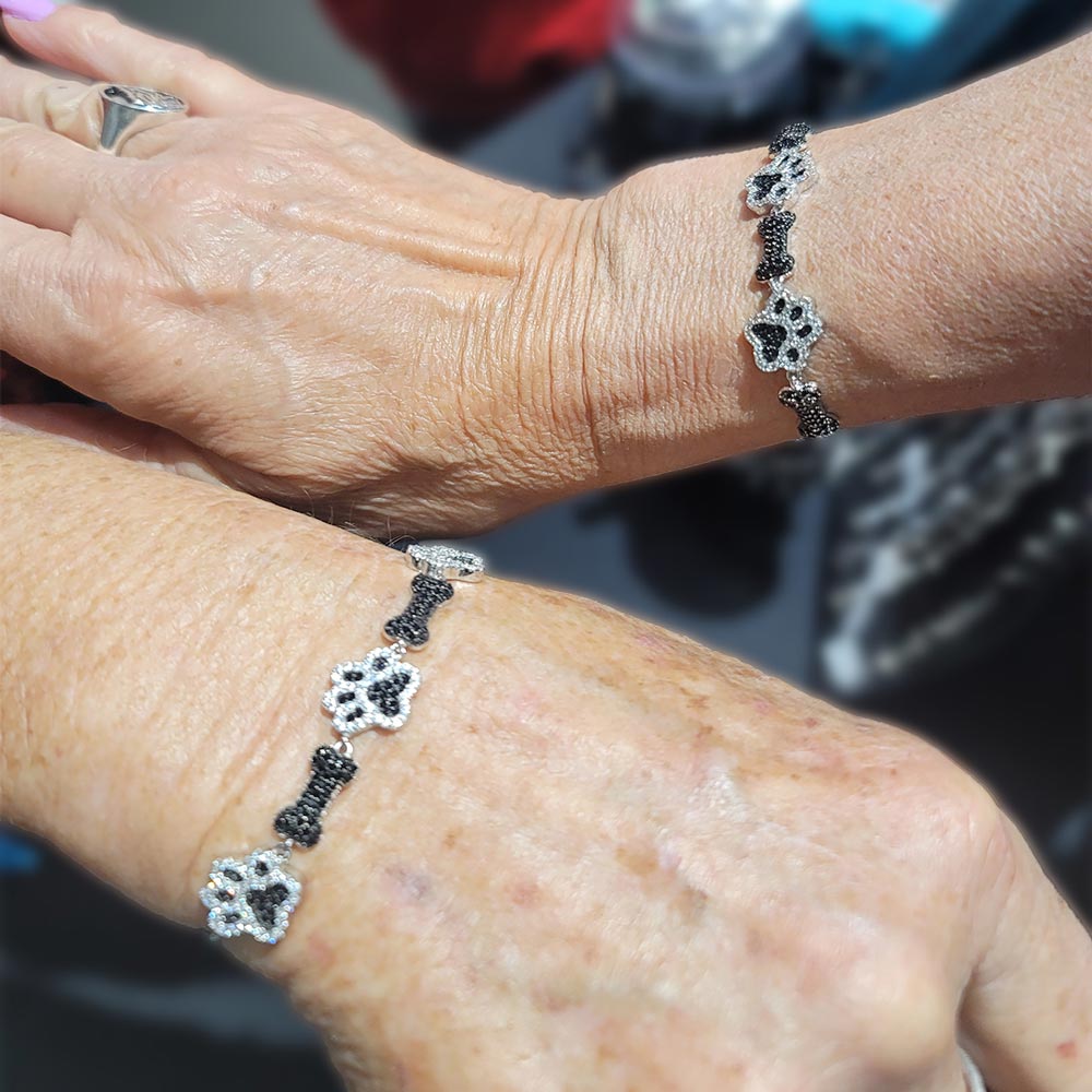 Shimming CZ Paws & Bones Bracelet In Sterling Silver W/Rhodium Plating